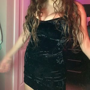 Black velvet form fitting dress w/ low v neck